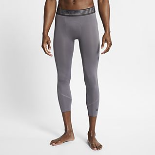 mallas nike pro hombre rosas