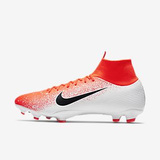 orange and white nike soccer cleats