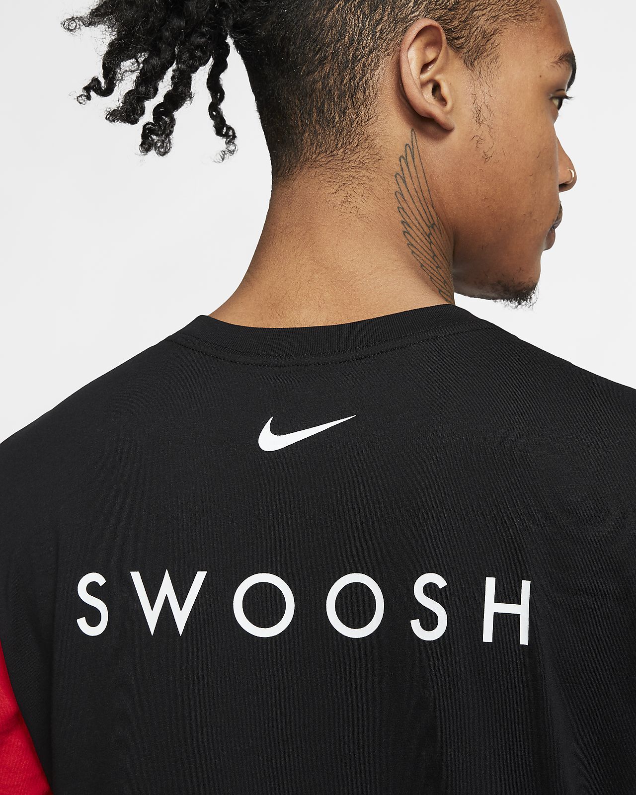 nike t shirt with swoosh in middle