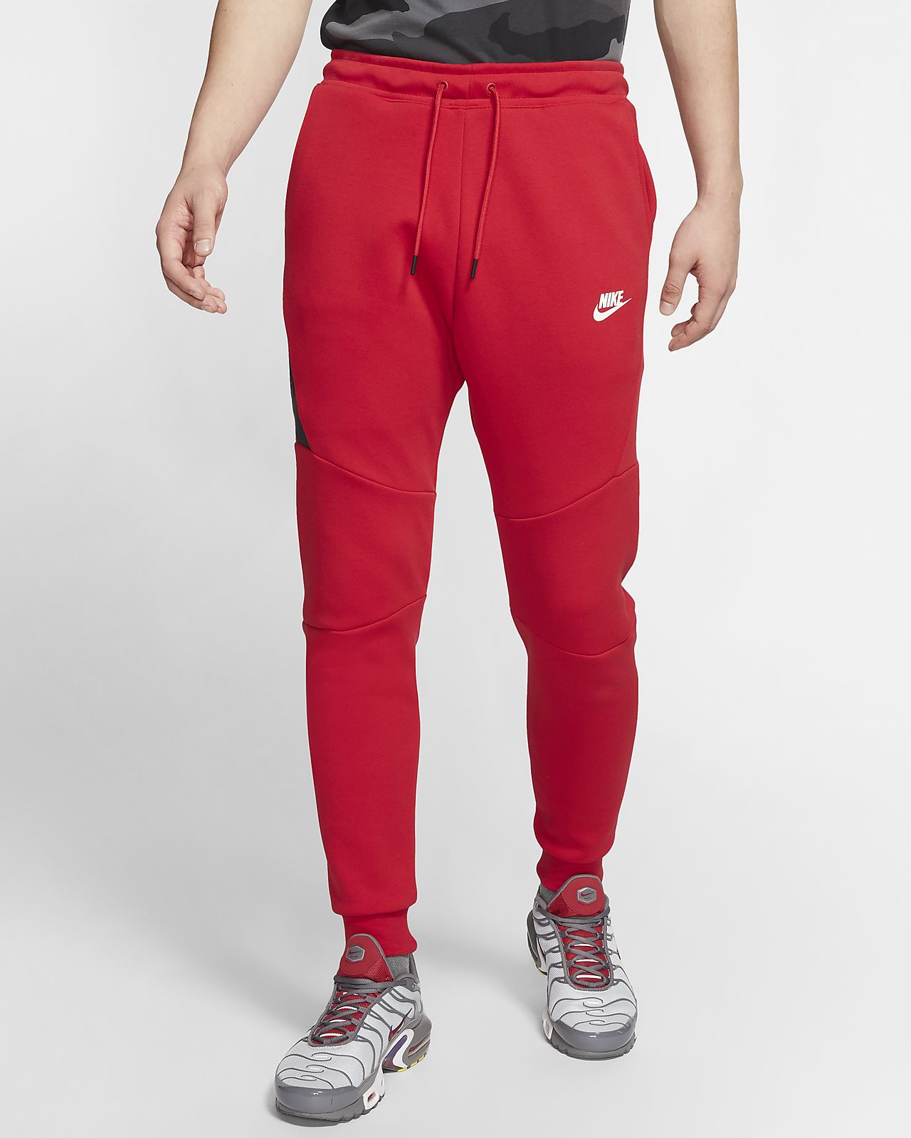 grey and red nike joggers