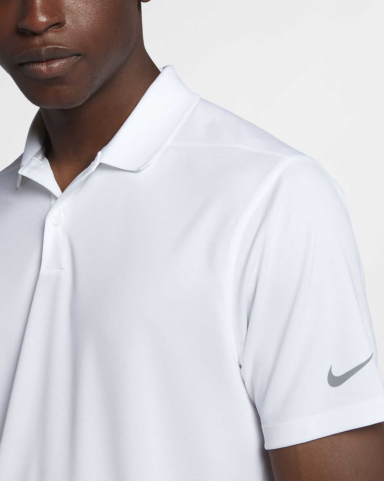 white nike golf shirt