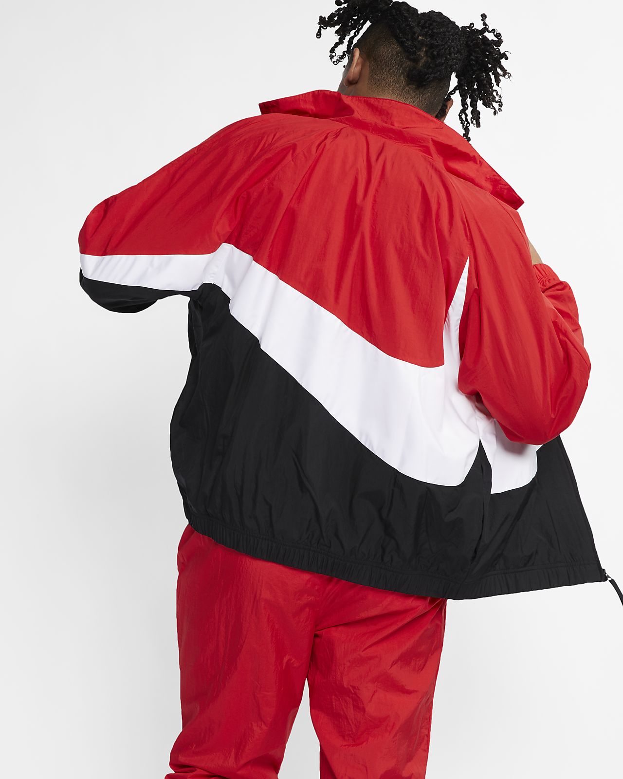 black nike tracksuit with red tick