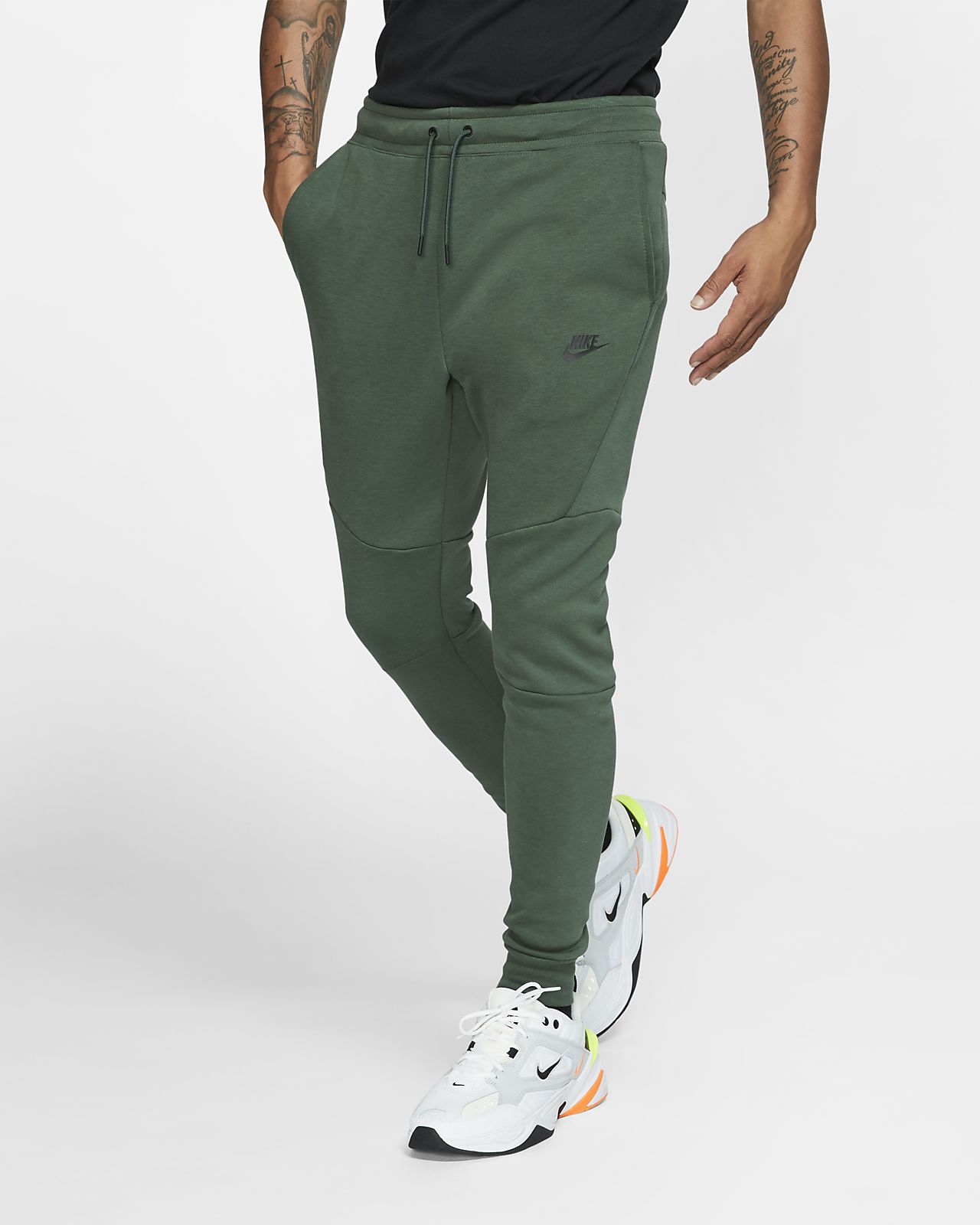 green nike tech fleece pants