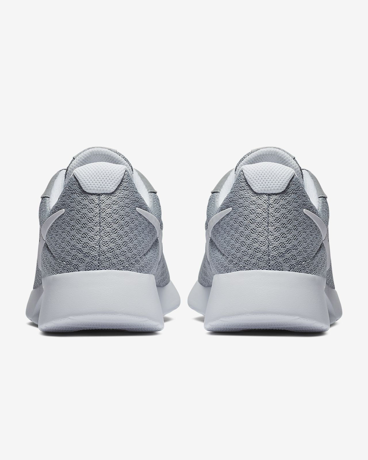 nike tanjun girls trainers white