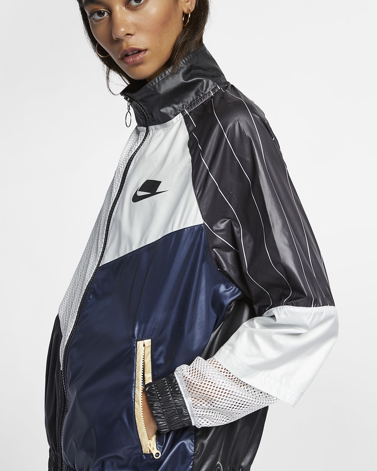 nike woven track top