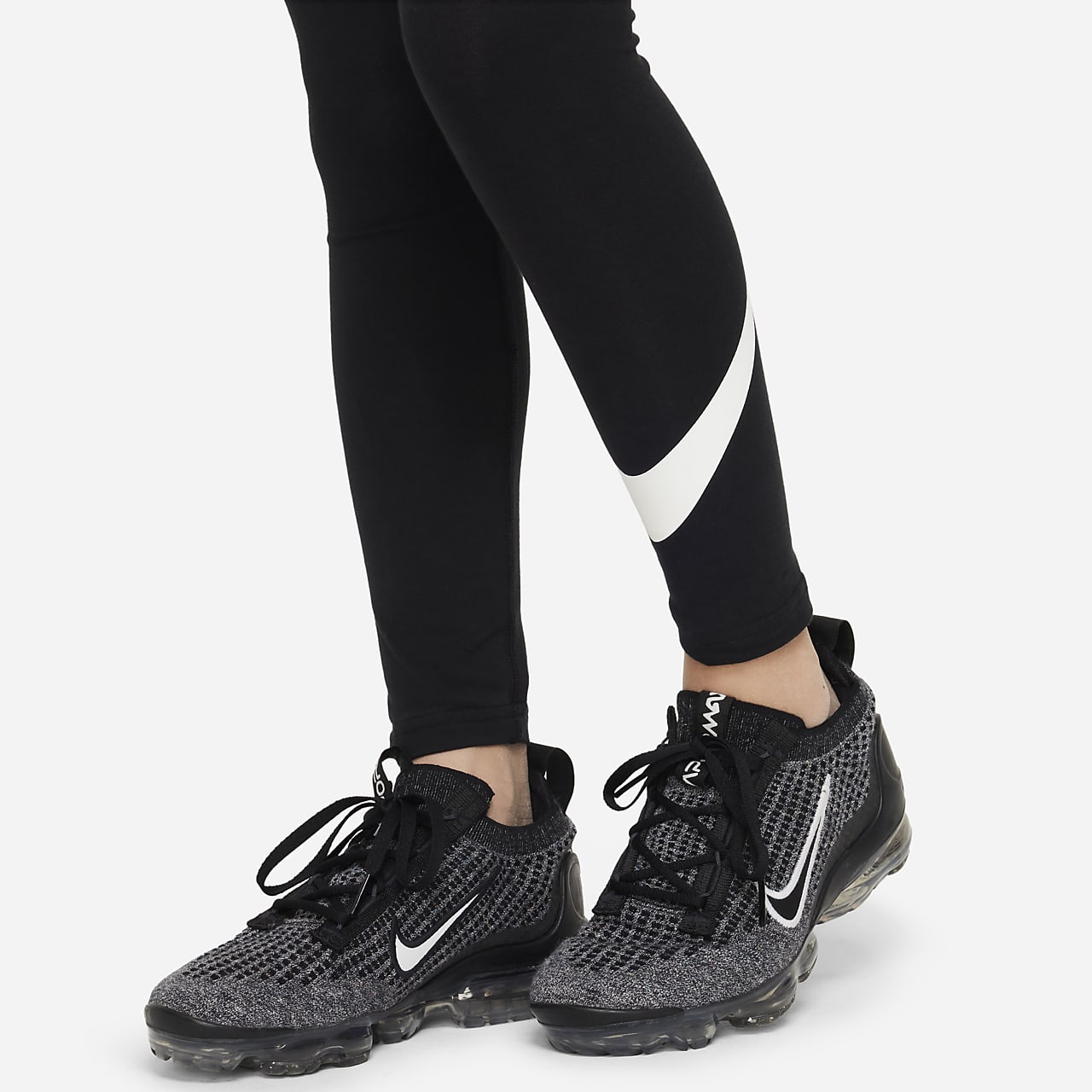 nike swoosh tight