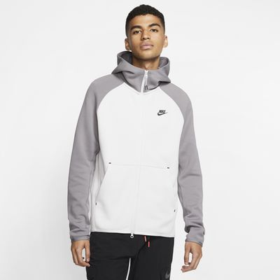 white and grey nike tech