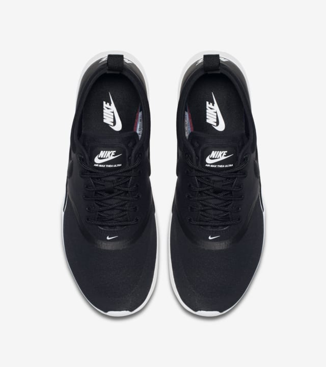 nike air max thea white with black tick modelled