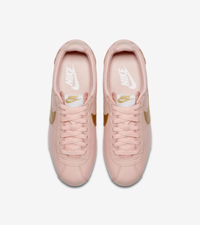 nike cortez peach and gold