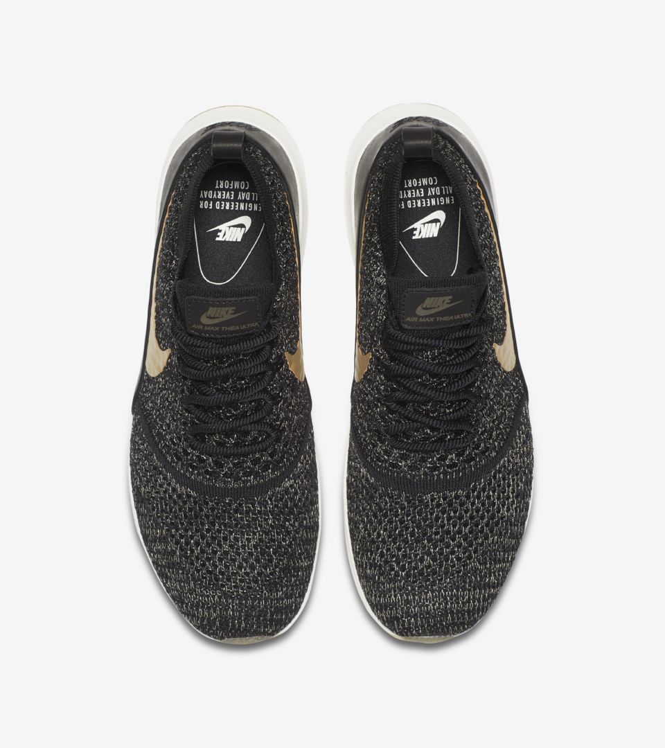 nike black and gold womens