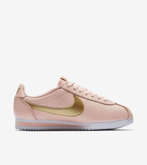 pink and gold nike