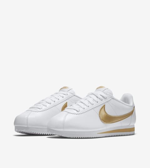 nike cortez womens white and gold