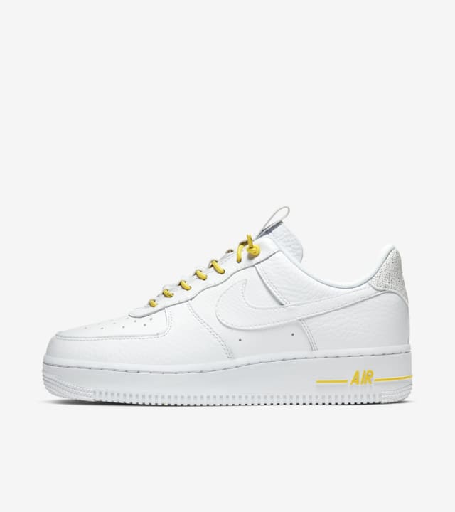 white and yellow nike air force 1