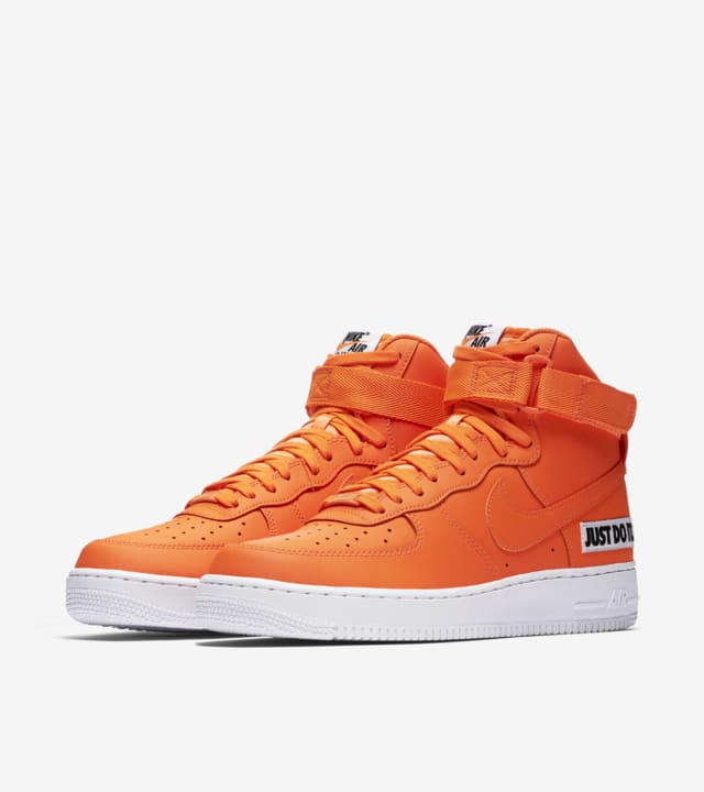 white and orange high top air force 1