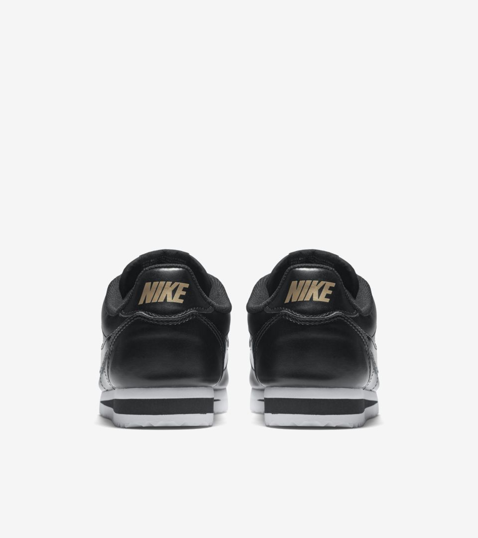 nike cortez black bronze