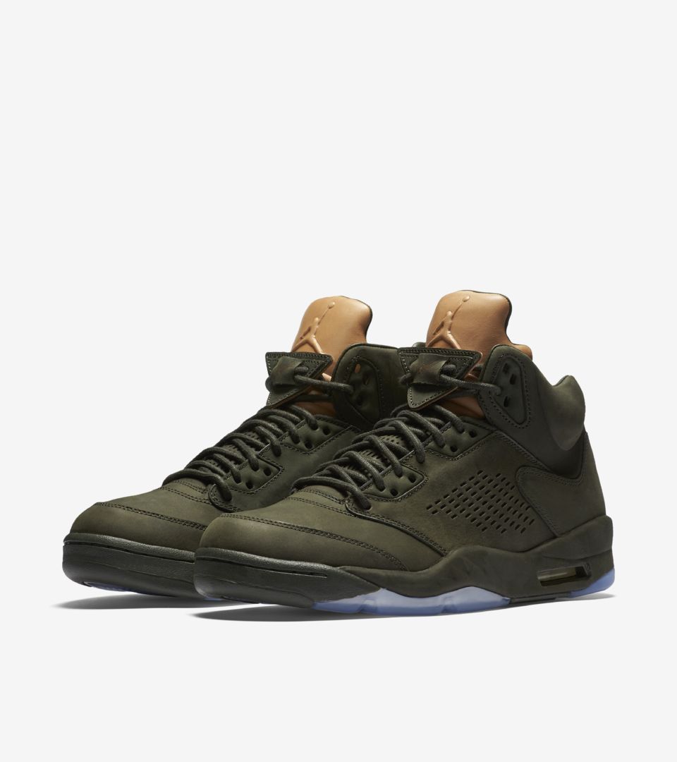 tan nike jordans