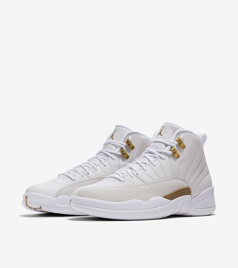 white jordans with gold trim