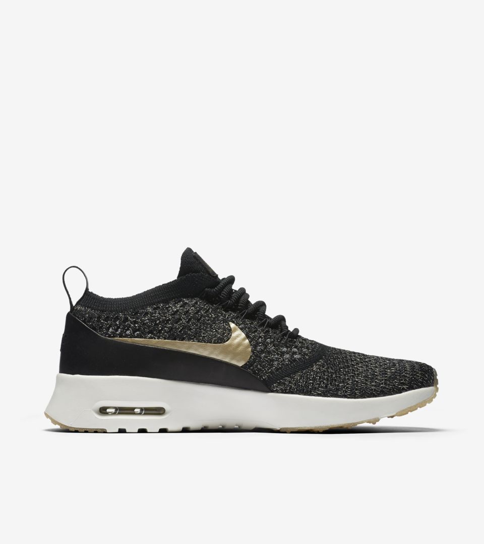 nike black and gold womens