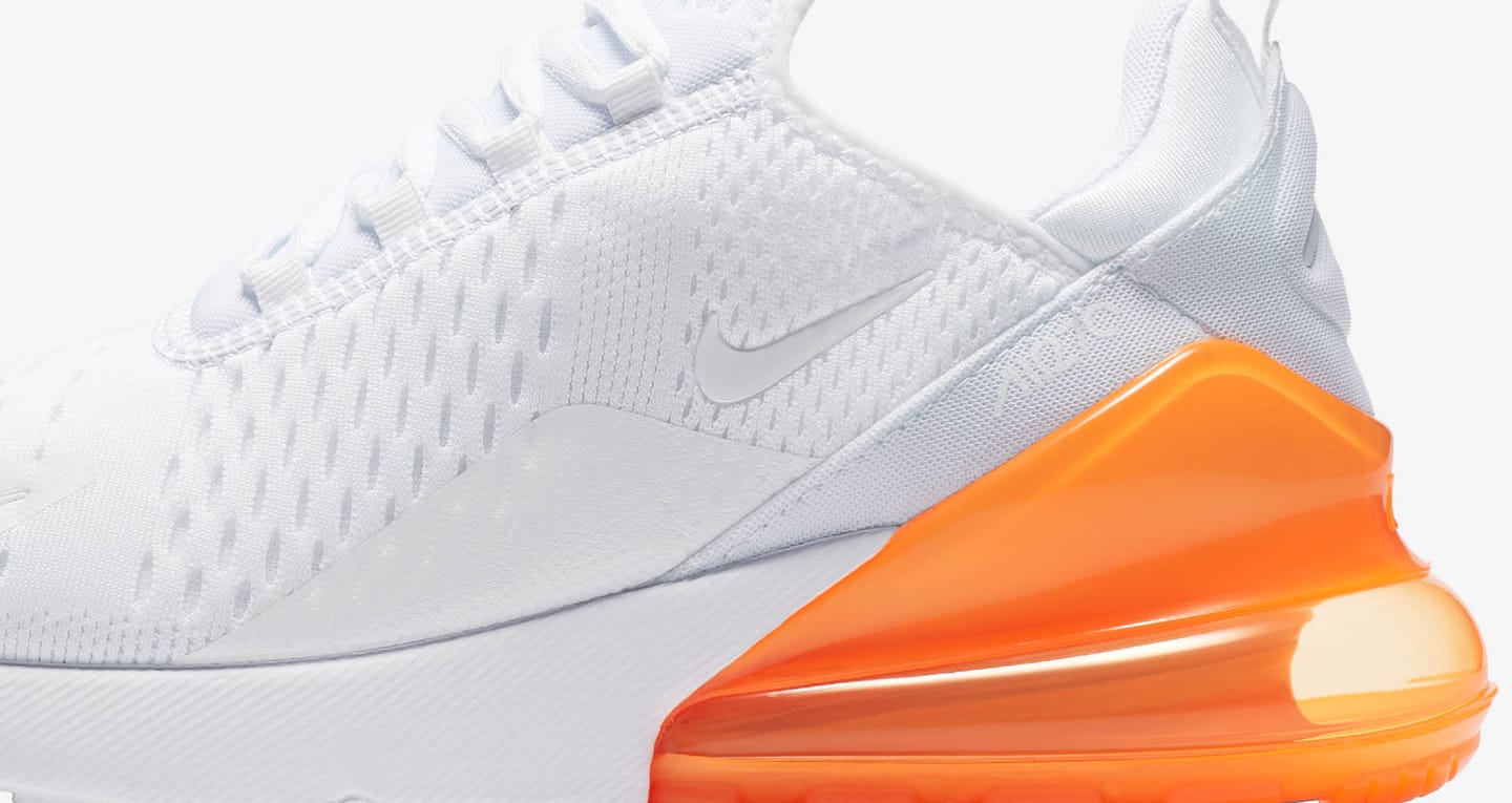 white and orange nike 270