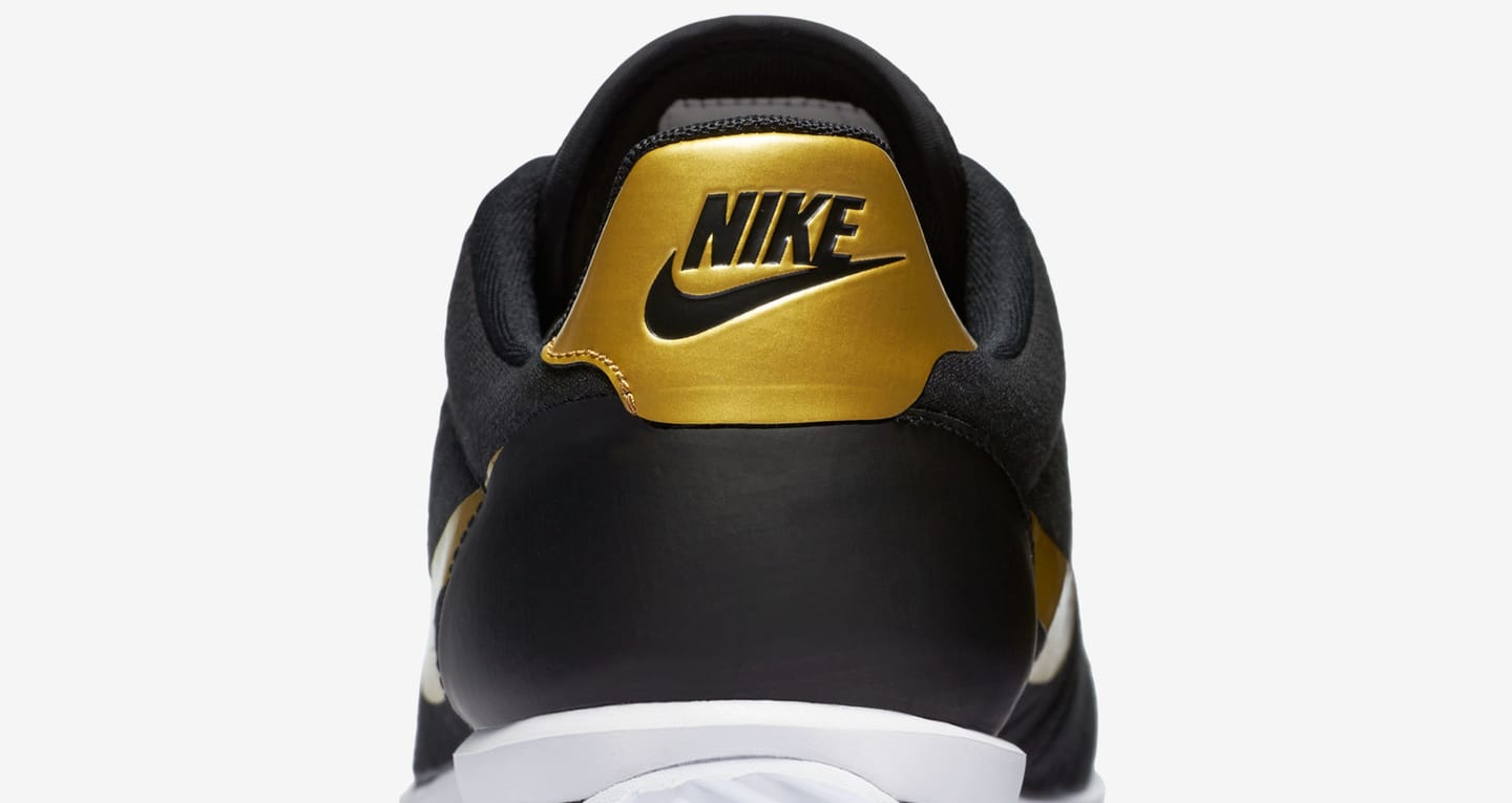 nike cortez ultra black gold