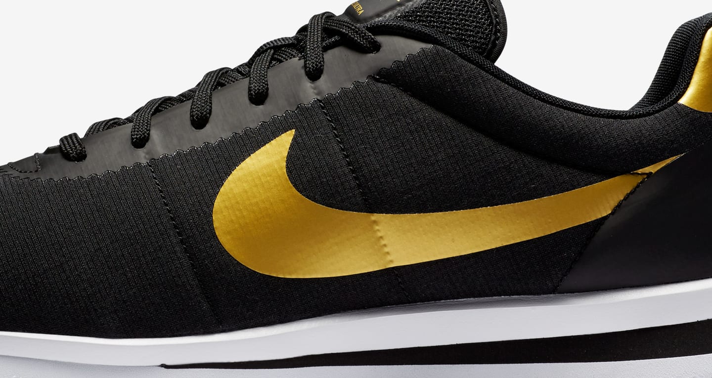 nike black and gold cortez