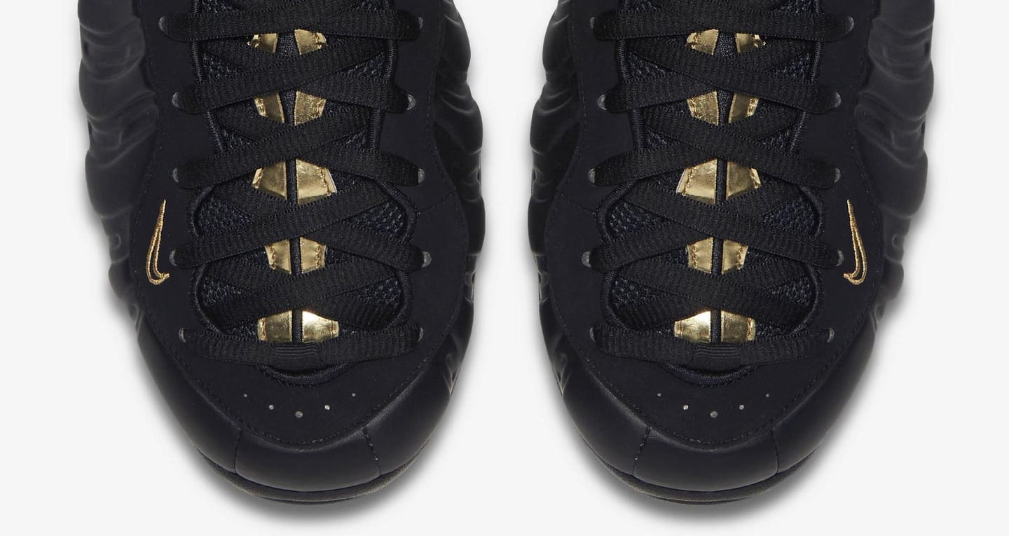 black and gold nike foams