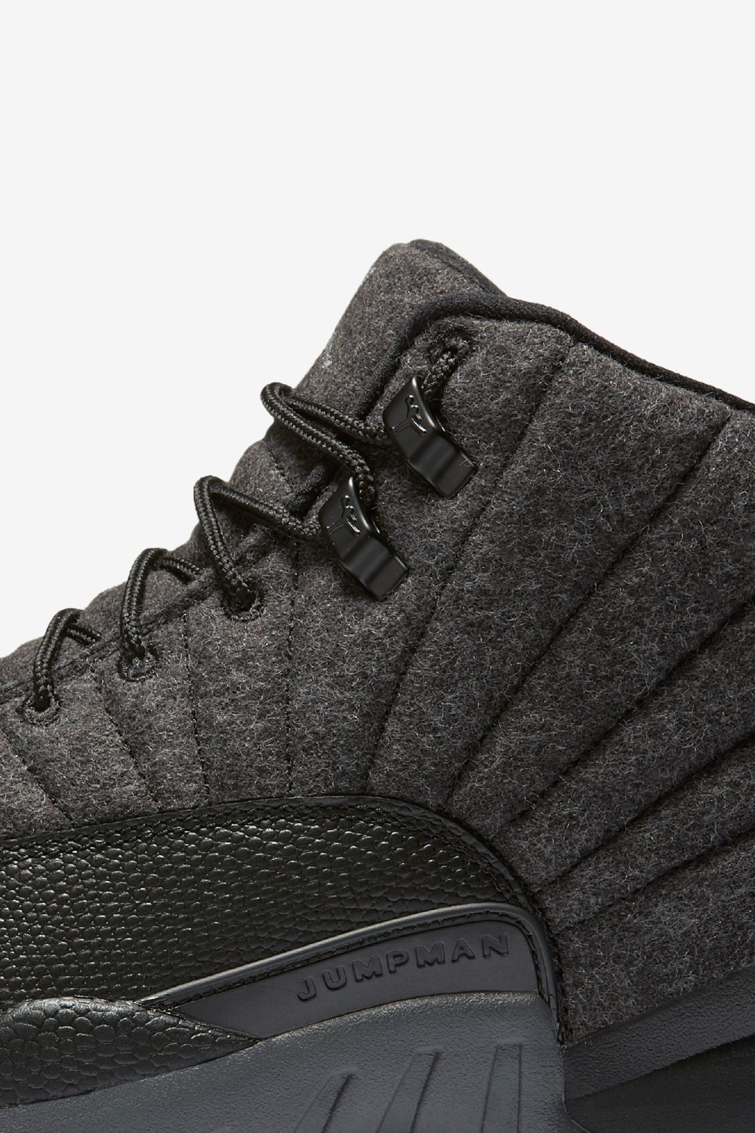 black and grey jordan 12