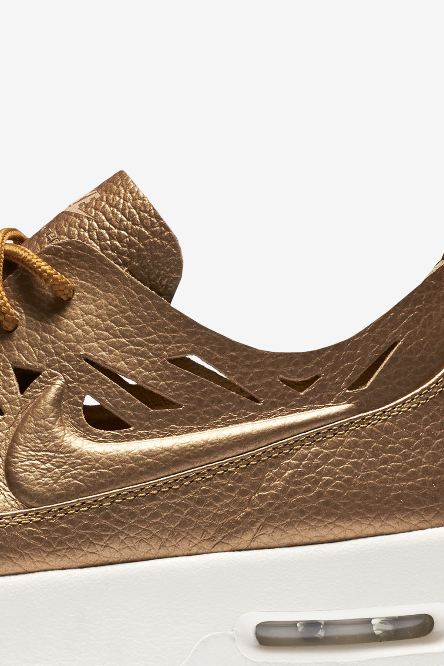 tan nikes for women