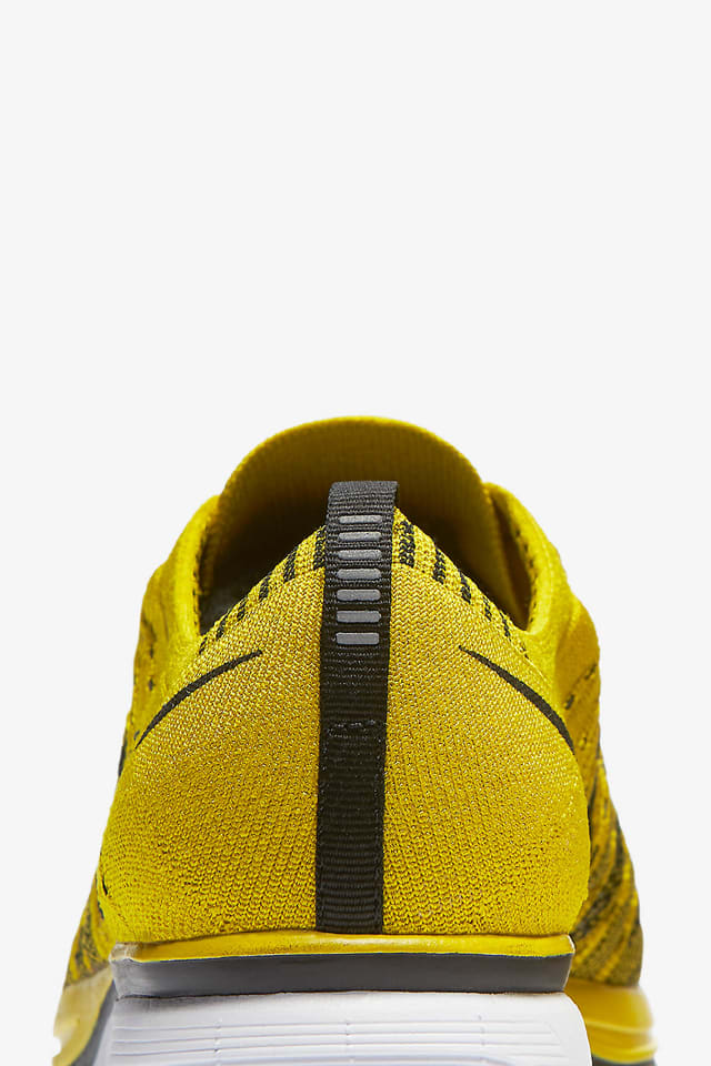 nike flyknit trainer yellow