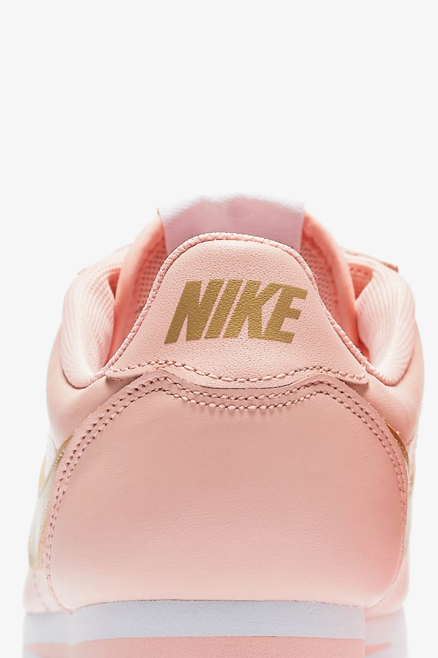 pink and gold nike cortez